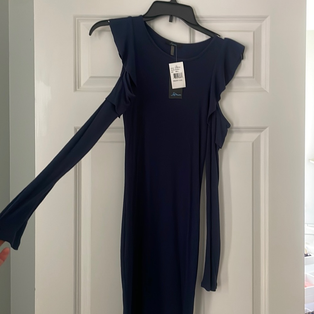 Navy blue long sleeve dress with open shoulders. Fitted dress. Perfect for fall